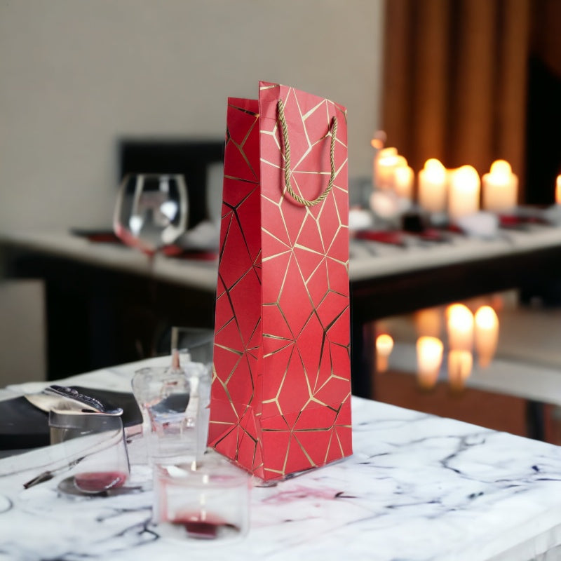 Vibrant Red wine and champagne gift bag with metallic gold rope handles